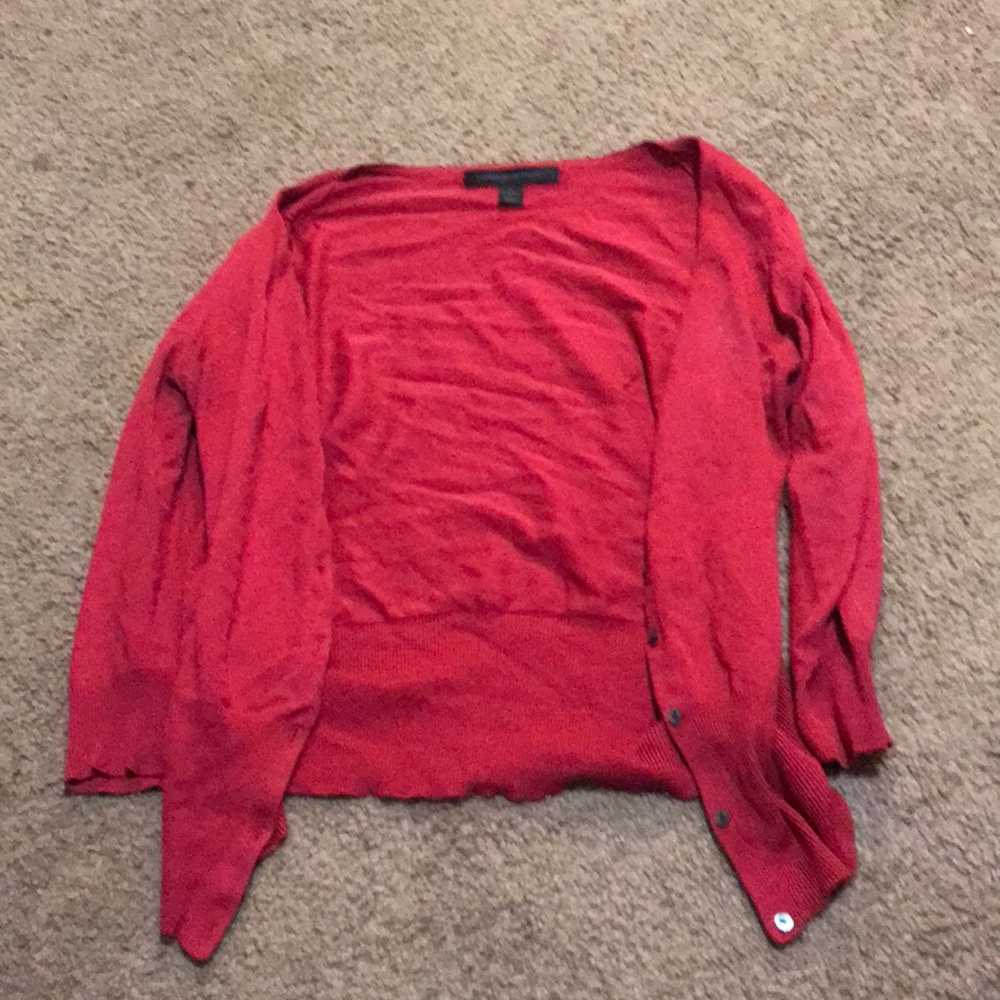 A pink sweater